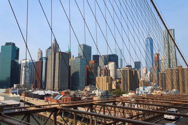 Lower Manhattan cityscape from Brooklyn bridge, New York City, USA