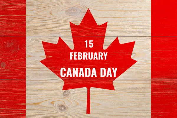 15 лютого день канади на пофарбованому дерев'яному фоні прапора — стокове фото