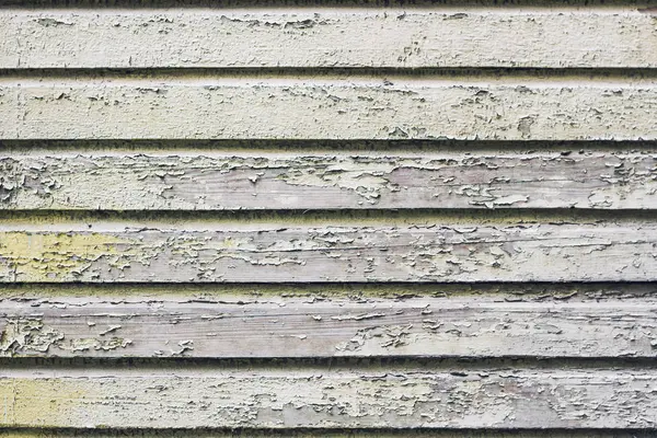 Pelar pintura blanca en la pared del tablón de madera — Foto de Stock