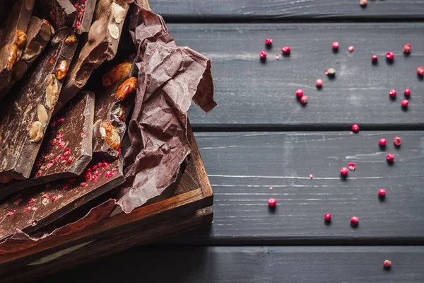 Variety of chocolate bars in wooden box