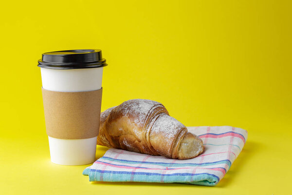 Latte art coffee with croissant so delicious on white