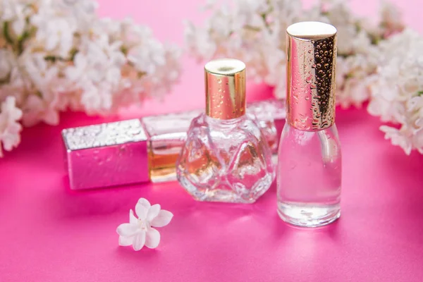 Bottles of perfume with lilac