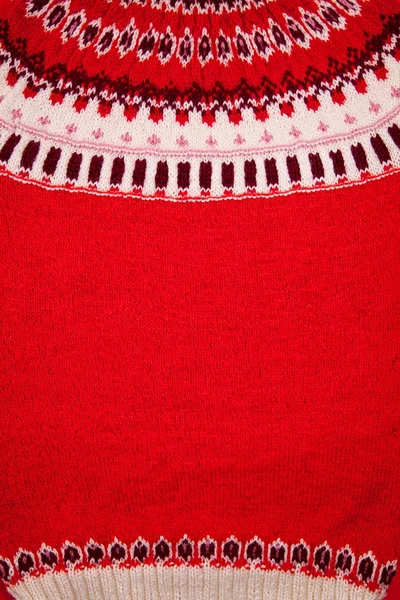 一个红色的冰岛毛衣的装饰品。针织冬季服装. — 图库照片