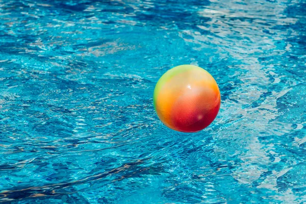 Water polo. Water sports. Ball left in swimming pool.