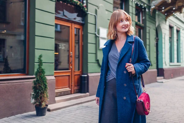 Stylish Young Woman Wearing Trendy Outfit Blue Coat Walking Red — Stock Photo, Image