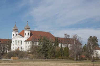 The Schlehdorf convent at the north end of Lake Kochel is inhabited by the Dominican order clipart