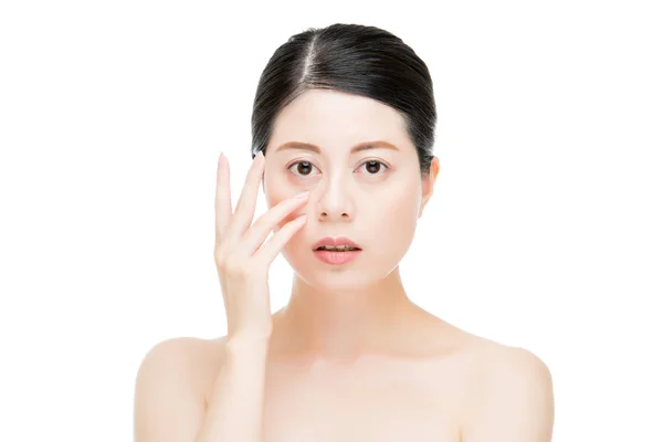 Asiatique beauté femme application oeil crème main geste — Photo