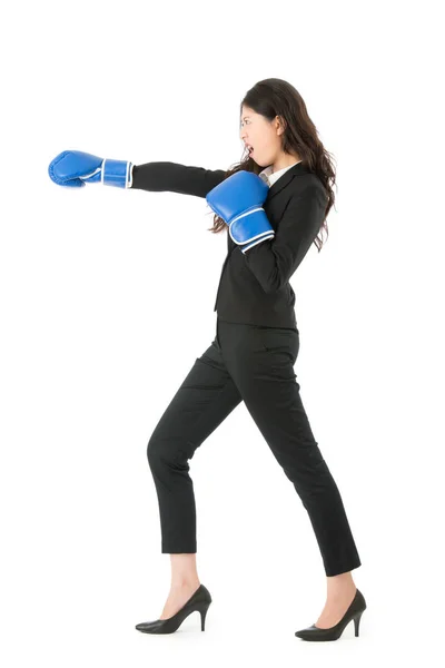 Businesswoman punching and hitting standing — Stock Photo, Image