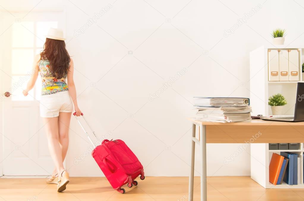 business woman holding suitcase  get away
