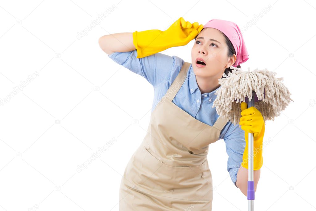 Tired and exhausted cleaning woman