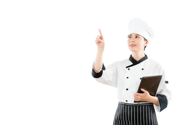 Chef segurando tablet tela touch pad no ar — Fotografia de Stock