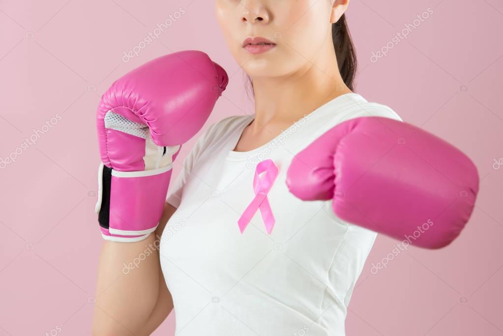 woman punch out for against breast cancer