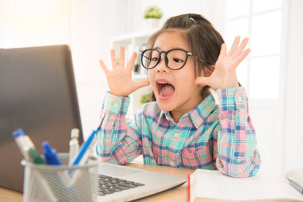 asian chinese child watching computer