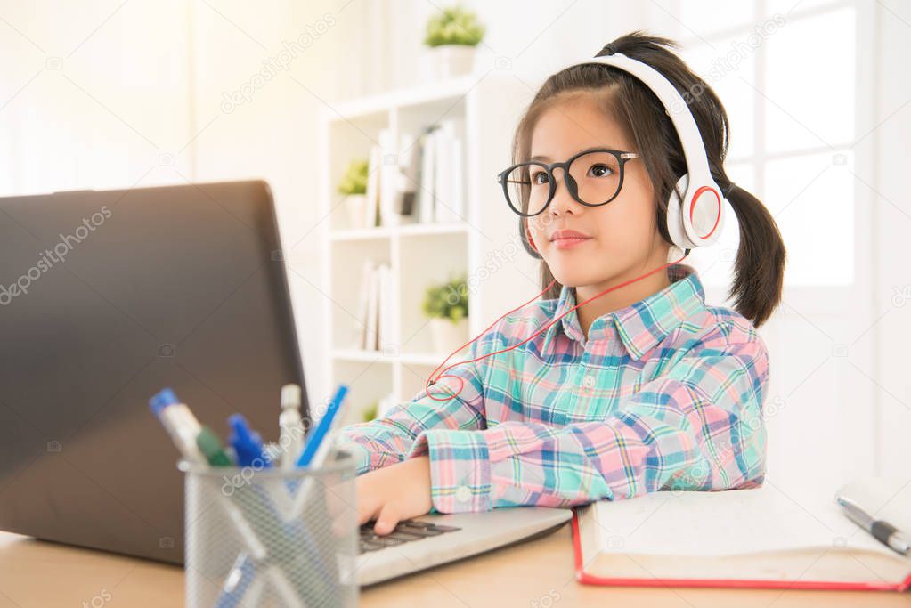 asian chinese schoolgirl study with computer