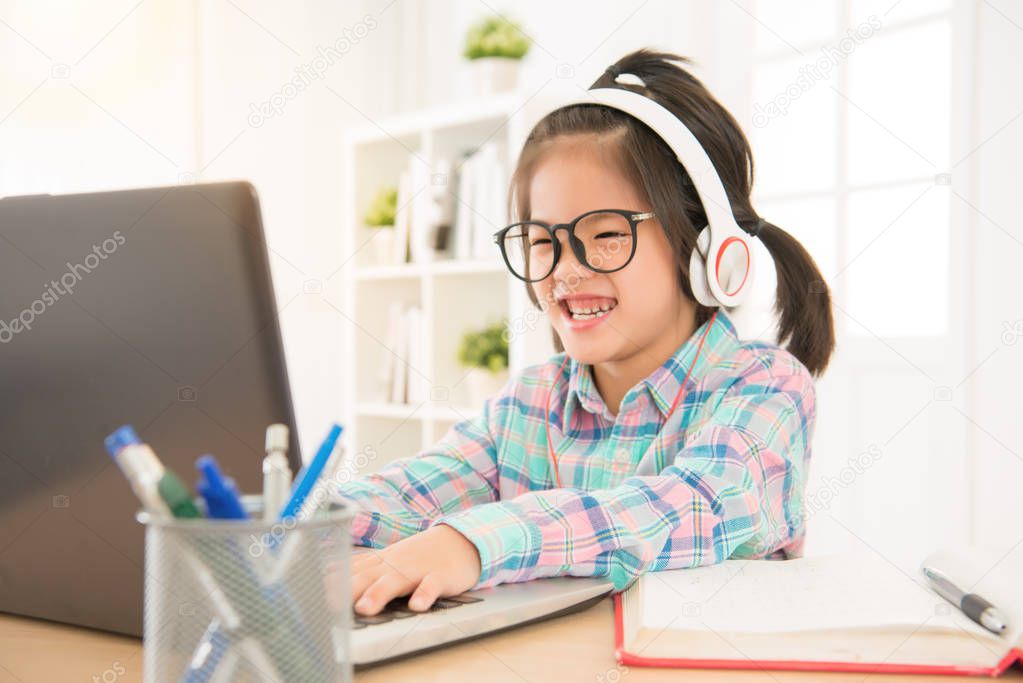 happy glasses kids playing computer