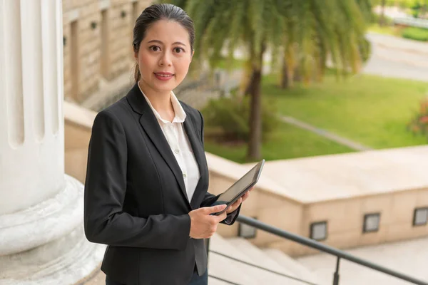 businesswoman holding digital tablet computer