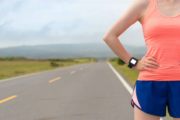 Athlete wearing sport heart rate smartwatch — Stock Photo, Image