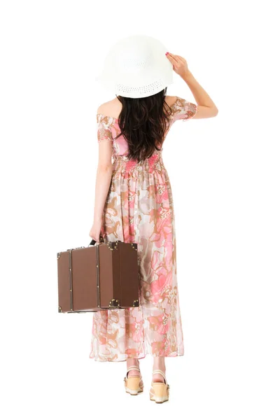 Mujer elegante que lleva equipaje antiguo retro — Foto de Stock