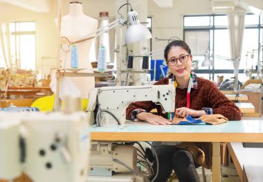confident woman employee looking at camera