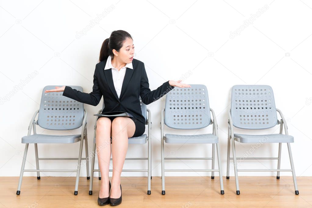 manager female model sitting on wood floor seat