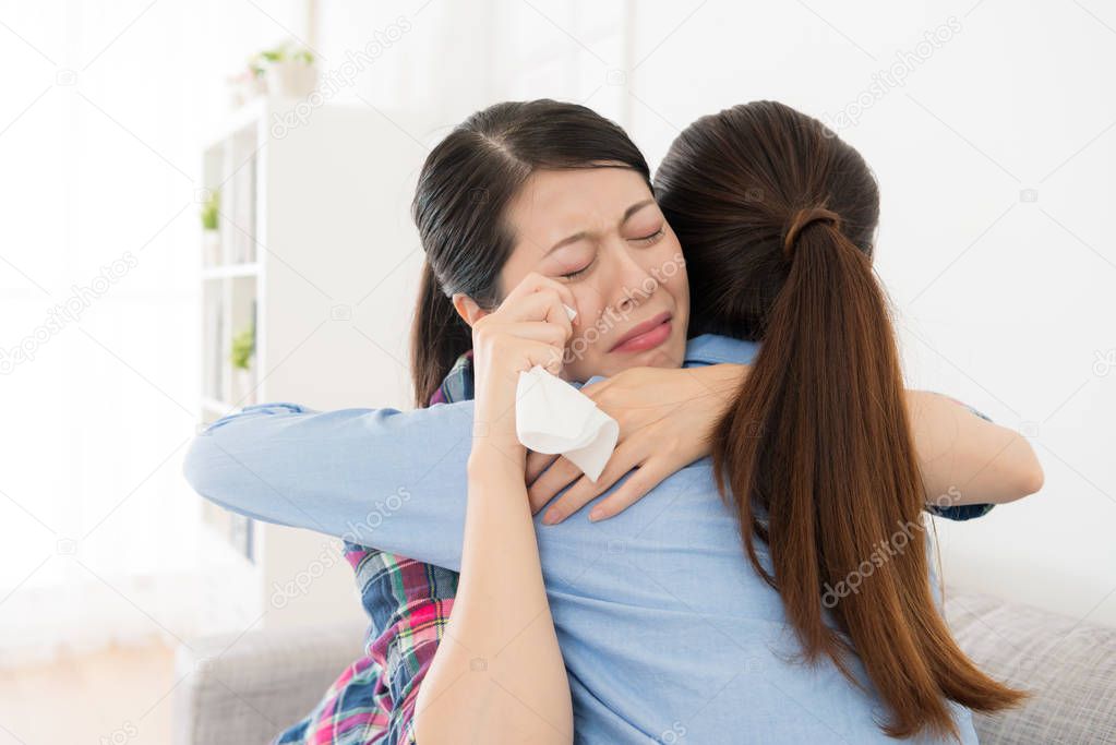 beautiful young woman giving embracing for girl