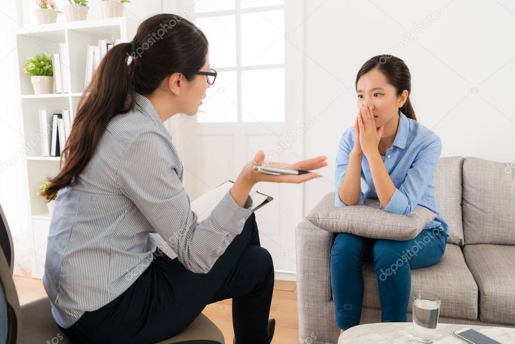 psychologist doctor talking with her patient