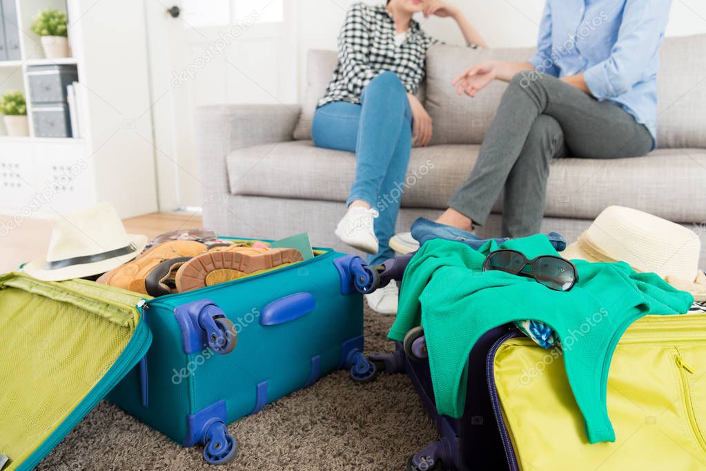 selective focus of travel luggage in living room
