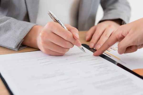 Business people signing deal contract document — Stock Photo, Image