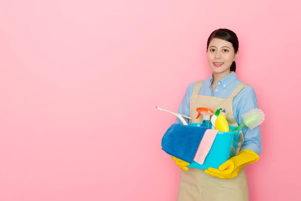 Pretty housekeeper woman holding cleaning tool — Stock Photo, Image