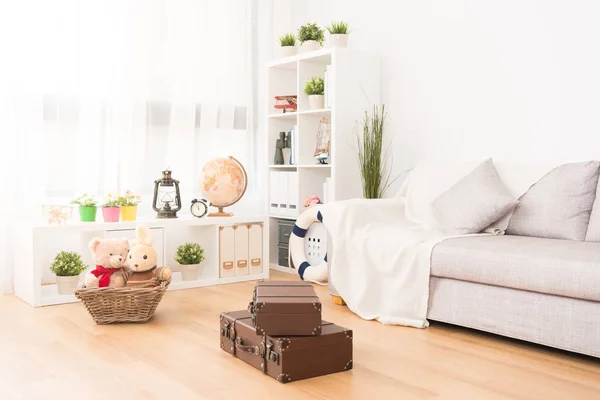 Kid playroom with toy and vintage suitcase — Stock Photo, Image
