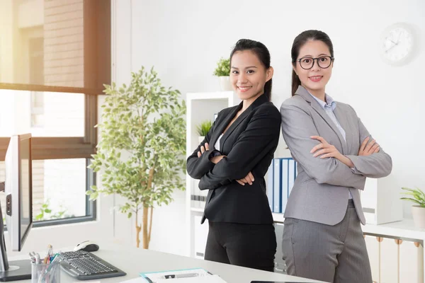 two confidence Asian office lady cross arms