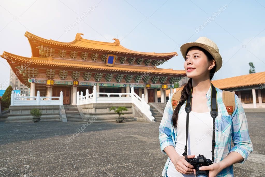 Asian woman visiting the Confucius temple