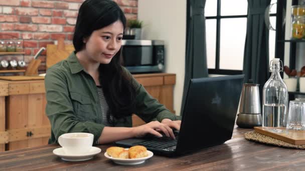 Slow Motion Young Asian Modern Girl Typing Eating Breakfast Same — Stock Video