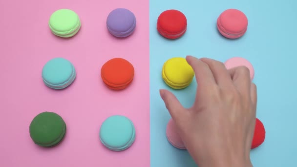Human Hand Takes Away Macaron Table Yellow One Twelve Placed — Stock Video