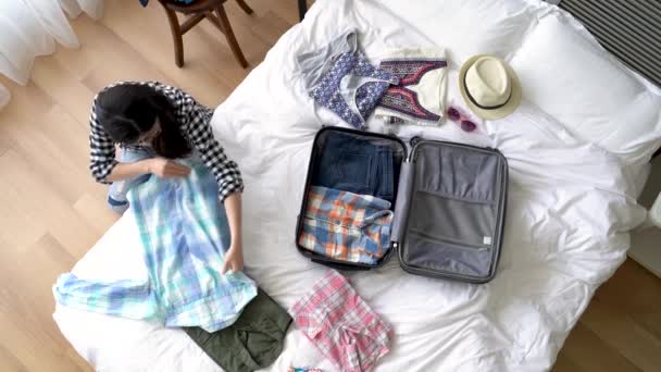 Asian Woman Folding Her Shirts Putting Her Luggage High Angle — Stock Video