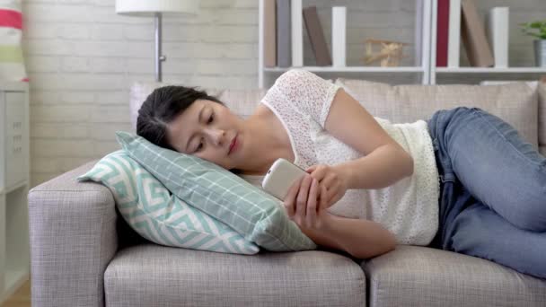 Sleepy Asian Woman Lying Sofa Just Received Some Rude Annoying — Stock Video