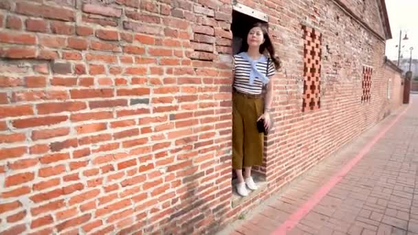 Asian Woman Standing Aside Ancient Alley Looking Forward — Stock Video