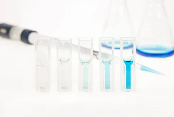 Solution sample in cuvette — Stock Photo, Image