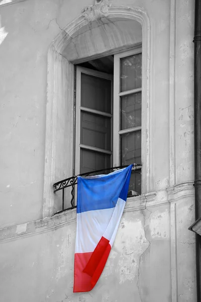 French Flag Hanging on the Window of a Building — Φωτογραφία Αρχείου