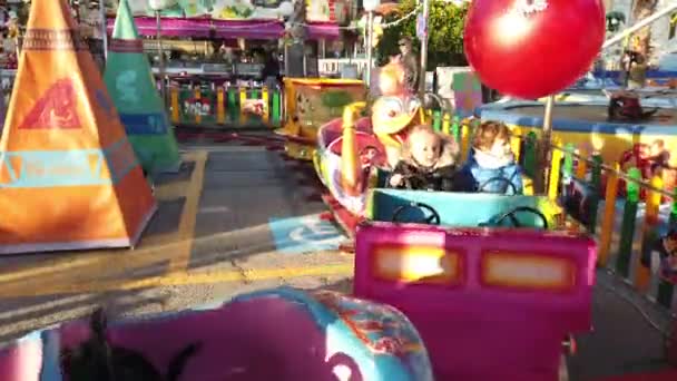 San Remo Italy December 2019 Two Young Children Ride Colorful — Stock Video