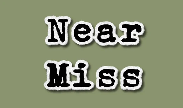 Near Miss  - Flat Torn Paper Words on Green Background - Concept Lettering Illustration