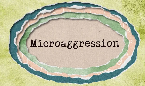 Mikroaggression Maschinengeschriebenes Wort Zerlumptem Papierlochhintergrund Konzept Zerfledderte Illustration — Stockfoto