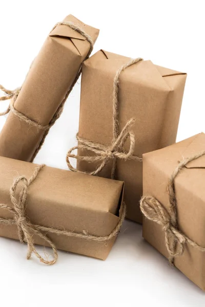 Stack of handcraft gift boxes on white background — Stock Photo, Image