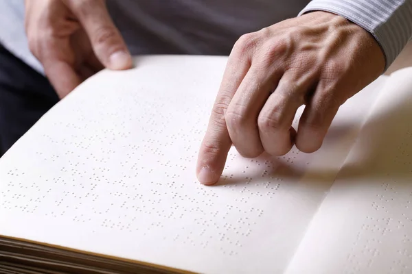 Blind person touching book, written in braille writing — Stock Photo, Image