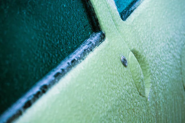 Frozen, ice-locked car door with icicles, ice and frost — Stock Photo, Image