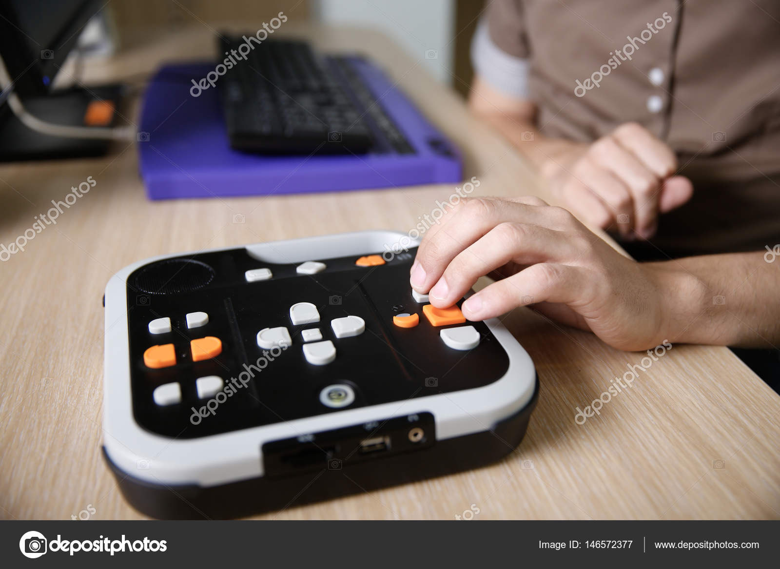 Blind person using audio book player for visually impaired — Stock