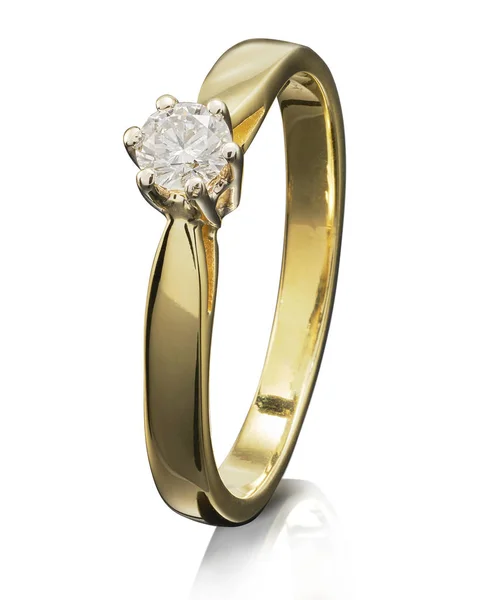 Золотое кольцо с драгоценным камнем на белом фоне — стоковое фото