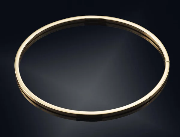 Golden bracelet isolated on black — Stock Photo, Image