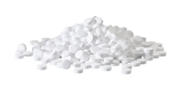 Amontoado de comprimidos brancos isolados no fundo branco — Fotografia de Stock