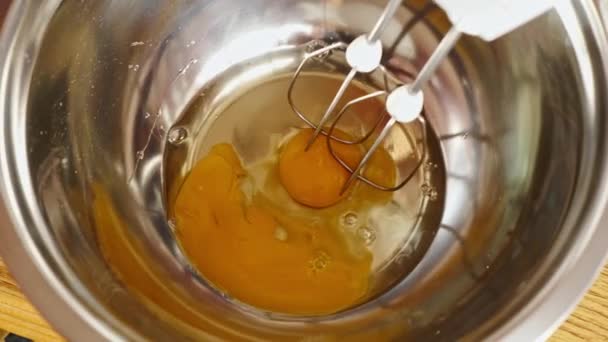 Close up of egg whisked with a electric mixer — Stock Video